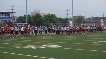 The Sarnia Imperials and GTA All Stars shake hands after the NFC Finals. (photo by Jake Jeffrey blackburnnews.com)