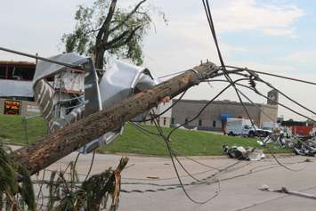 Crews assess and clean up the damage left near the EC Row Expressway and Central Avenue in Windsor on August 25, 2016 after a tornado hit the area. (Photo by Ricardo Veneza)