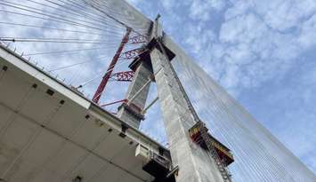 the Canadian tower of the Gordie Howe International Bridge with construction elevator, May 14, 2024. (Photo by Maureen Revait) 