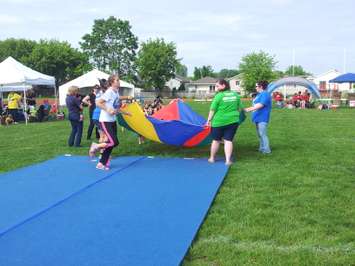 Local residents participate in Relay for Life 2015 at Chatham Kent Secondary School, June 13, 2015. (Photo by the Blackburn Radio Summer Patrol)