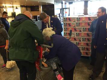 Members of Sarnia's Elks Lodge and Real Canadian Superstore unveil the stores new 