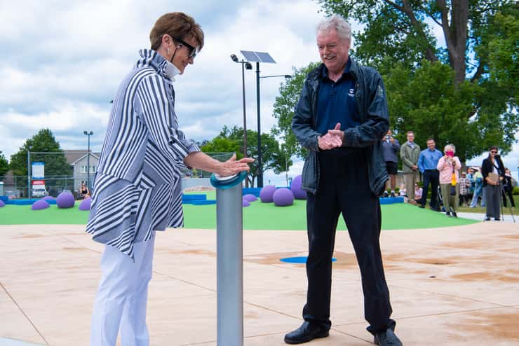 Val Gladwish officially turns on the splash pad for the first time with Mayor Mike Bradley. June 18, 2026. (Photo courtesy of the City of Sarnia)