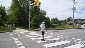 A pedestrian and cyclist crossing on Exmouth Street at the Howard Watson Nature Trail. 3 June 2020. (BlackburnNews.com photo by Colin Gowdy)