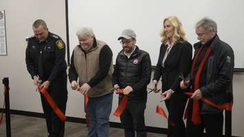 Sarnia Police Chief Norm Hansen (far left) and Sarnia Mayor Mike Bradley (far right), joined by representatives of Aamjiwnaang and Europro, to cut the ribbon officially opening the new training centre at Lambton Mall. January 16, 2020 Photo by Melanie Irwin