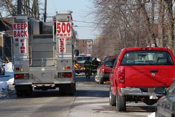 Firefighters at the scene of two house fires in the 800-block of Assumption St. in Windsor March 2, 2015. (Photo by Adelle Loiselle.)