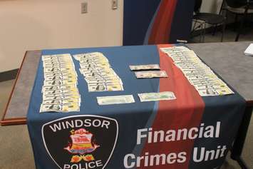 Counterfeit money found by the Windsor Police Service on display at media conference, December 1, 2015 (Photo by Maureen Revait) 