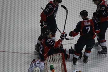 Windsor Spitfires forward Brendan Lemieux sits on the ice celebrating his goal after crashing the net against the Owen Sound Attack on January 7, 2016. (Photo by Ricardo Veneza)