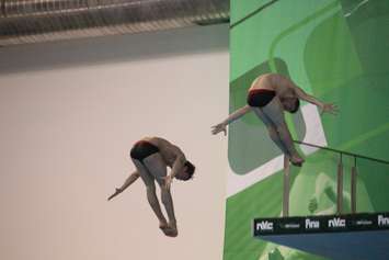 Divers compete in the FINA Diving World Series 2015 in Windsor, May 22, 2015. (Photo by Jason Viau)