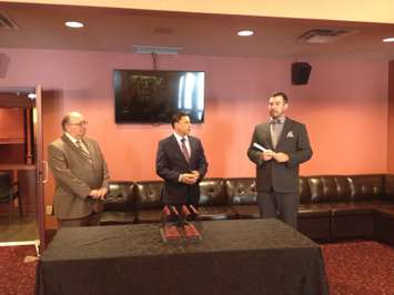 Economic Development and Infrastructure Minister Brad Duguid explores accessibility options offered at Imperial Theatre  May 29, 2015 (BlackburnNews.com Photo by Briana Carnegie).