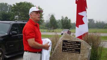 Global Donuts on London Line officially raised the Canadian flag and unveiled a memorial plaque Tuesday. June 30, 2015 (BlackburnNews.com Photo by Briana Carnegie)
