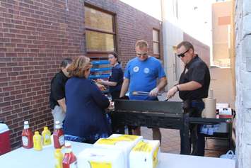 Free BBQ at the Capitol Theatre before the presentation on the benefits to thinking positive. September 13, 2016. (Photo by Natalia Vega)