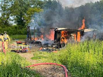 Structure fire reported in the area of Tashmoo Avenue and Churchill Road. June 16, 2025. (Photo courtesy of Sarnia Fire Rescue via Facebook)