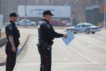 One person has been sent to hospital following a crash at the intersection of Lauzon Rd. and McHugh St., April 1, 2015. (Photo by Jason Viau)