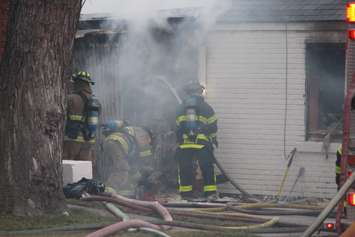 Windsor fire crews battle a blaze at 1574 Gladestone Ave., April 7, 2015. (Photo by Jason Viau)