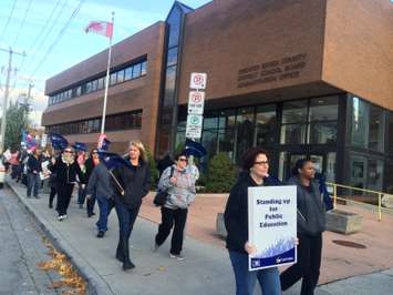 OSSTF members and labour supporters hold a protest outside of the Greater Essex County District School Board building in Windsor on November 6, 2015. (Photo by Ricardo Veneza)