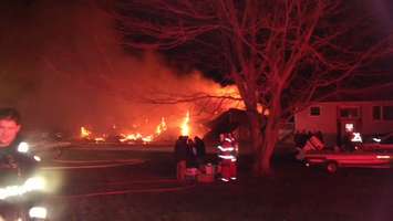Firefighters battle a blaze in Leamington on January 5, 2016. (Photo courtesy Bob Kissner)