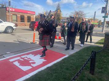 Ceremonial first walk on the memorial sidewalks in front of the Royal Canadian Legion Branch 255, October 31, 2025. (Photo by Maureen Revait) 