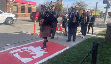 Ceremonial first walk on the memorial sidewalks in front of the Royal Canadian Legion Branch 255, October 31, 2025. (Photo by Maureen Revait) 