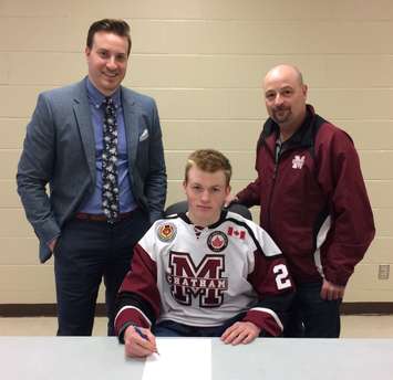 Cameron Welch (centre) poses for a photo with Chatham Maroons head coach Kyle Makaric (left) and Maroons General Manager Kevin Fisher (right). (Contributed photo)