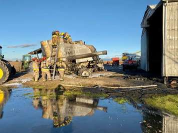 Combine fire in the 5900 block of Lasalle Line. October 27, 2019. (Photo courtesy of Petrolia & North Enniskillen Fire Department via Facebook)