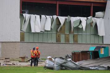 Crews assess and clean up the damage left near the EC Row Expressway and Central Avenue in Windsor on August 25, 2016 after a tornado hit the area. (Photo by Ricardo Veneza)