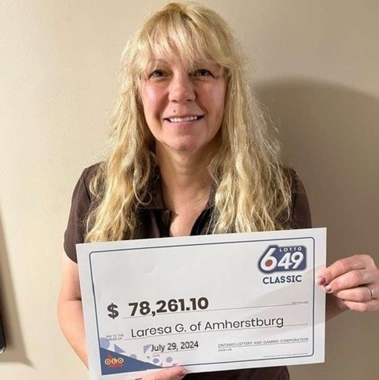 Laresa Grondin of Amherstburg displays her prize cheque at the OLG Prize Centre in Toronto, July 29, 2024. Photo submitted by Ontario Lottery and Gaming.