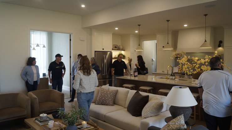 The living room and kitchen in the Bluewater Health Dream Home (Photo by: Lindsay Newman/ Blackburn Media)