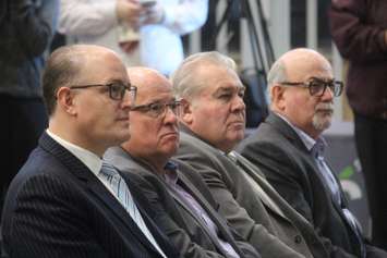 Windsor Mayor Drew Dilkens, from left, Dominos Canada president and CEO Mike Schlater, WFCU board chairman Marty Gillis and Essex County Warden Gary McNamara at the groundbreaking of St. Clair College's new sports complex, February 1, 2019. Photo by Mark Brown/Blackburn News.